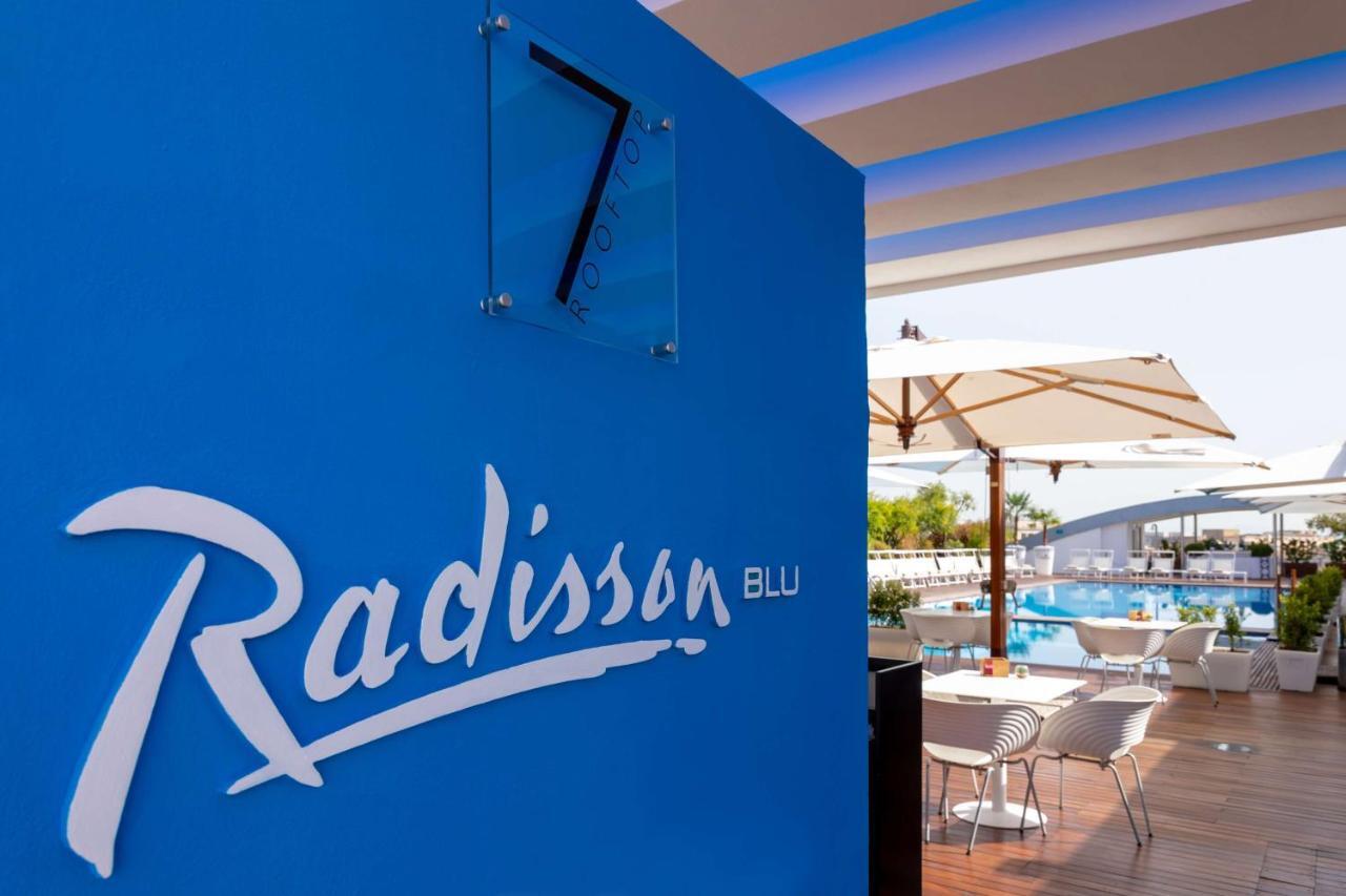 Radisson Blu Es. Hotel, Roma Екстериор снимка Radisson Blu logo